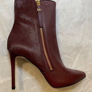 Brand new Michael Kors dawson bootie in plum